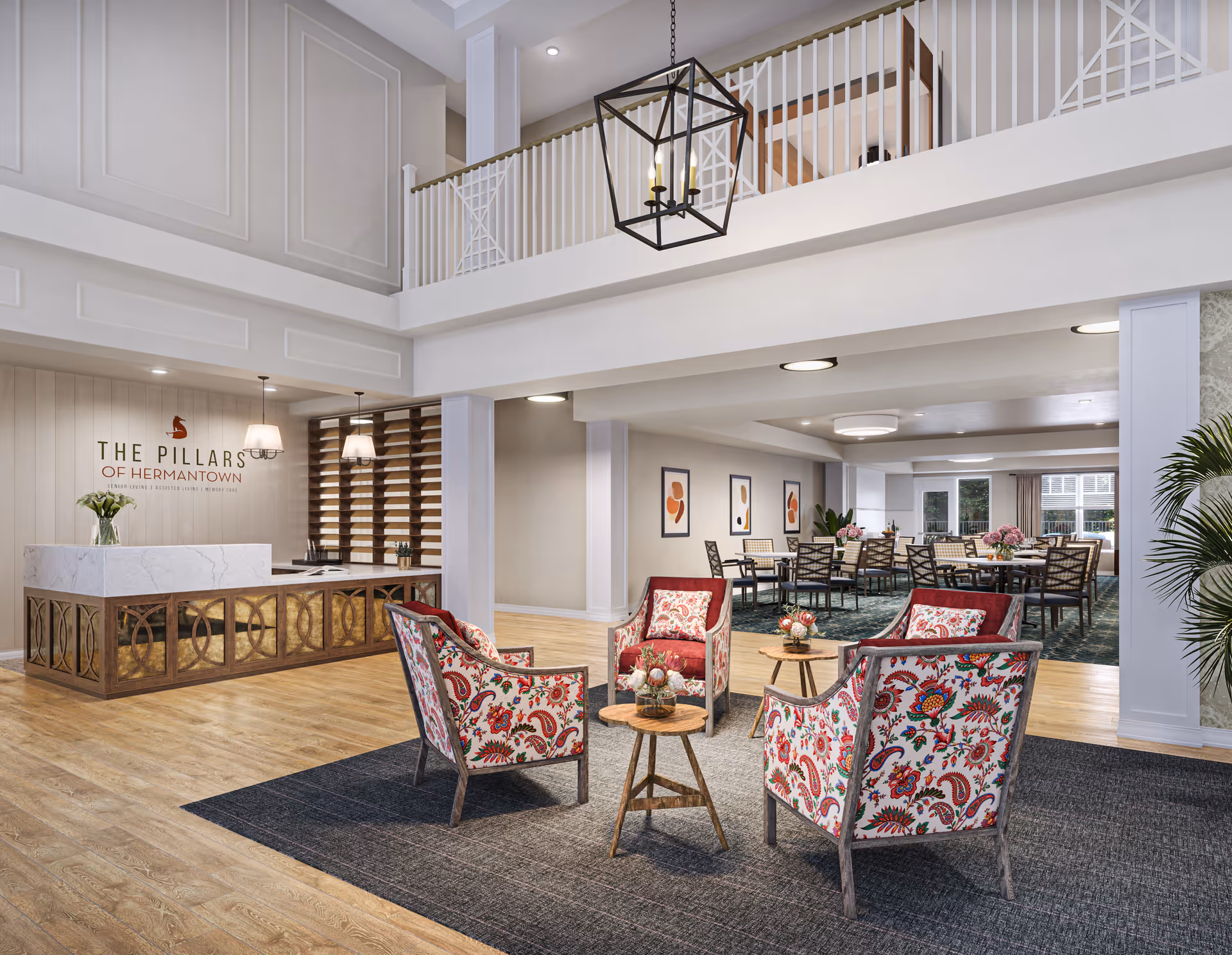 Main lobby area of The Pillars of Hermantown with reception desk and patterned seating.