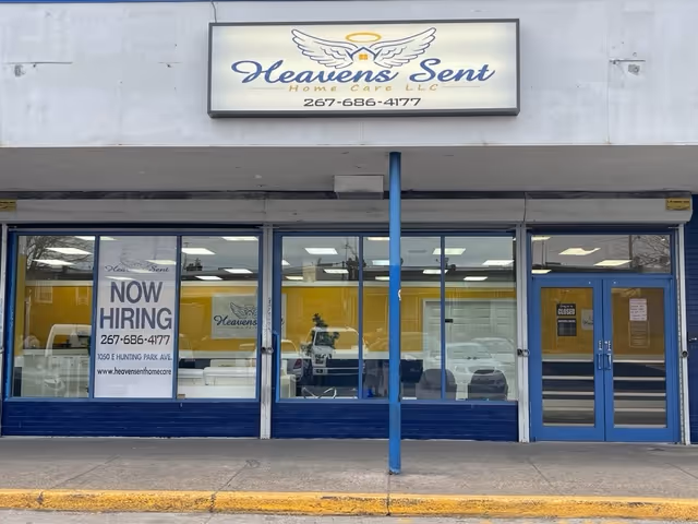 Storefront of Heavens Sent Home Care Services LLC with 'Now Hiring' sign in the window