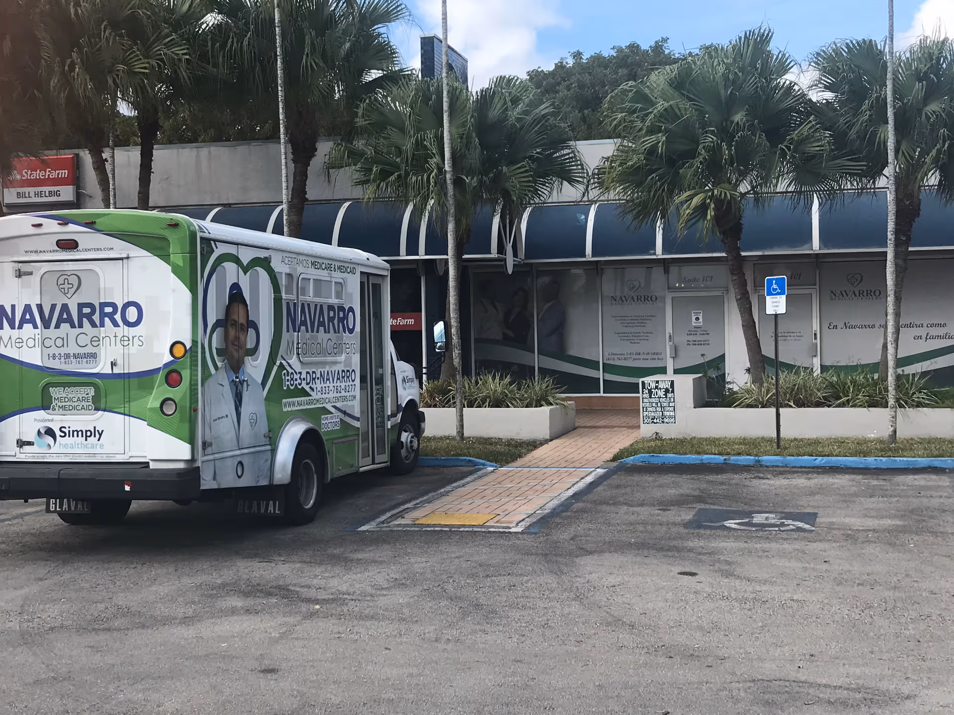 Navarro Medical Centers building exterior with a branded transport van parked in front.