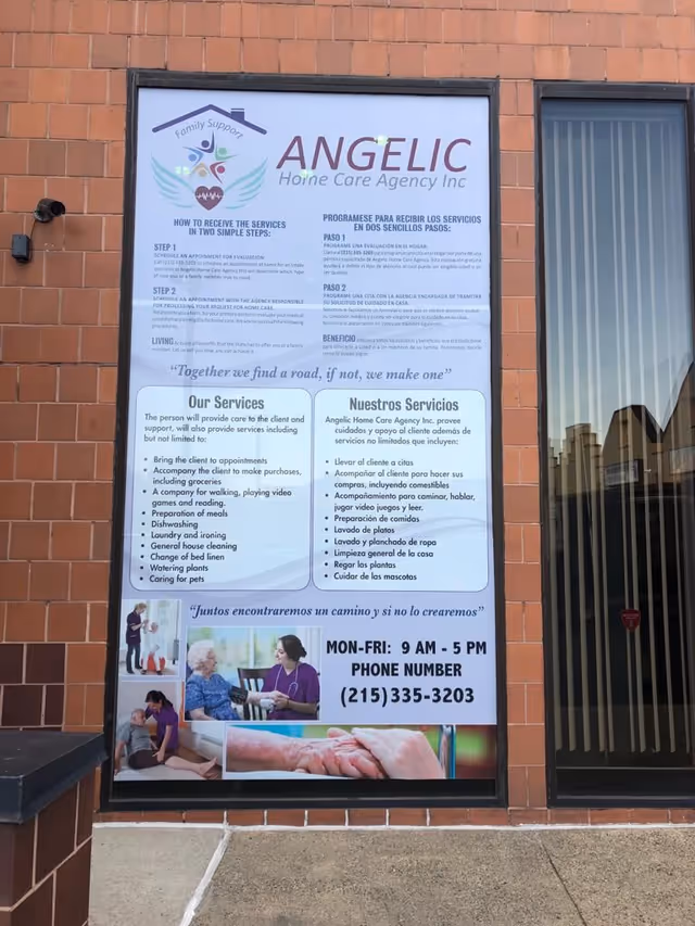 A large window display on a brick building shows Angelic Home Care Agency Inc.