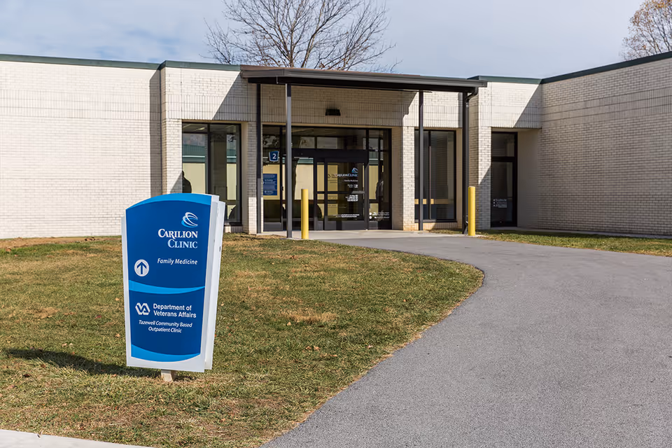 Exterior view of Carilion Clinic Home Care facility with a blue sign by the entrance