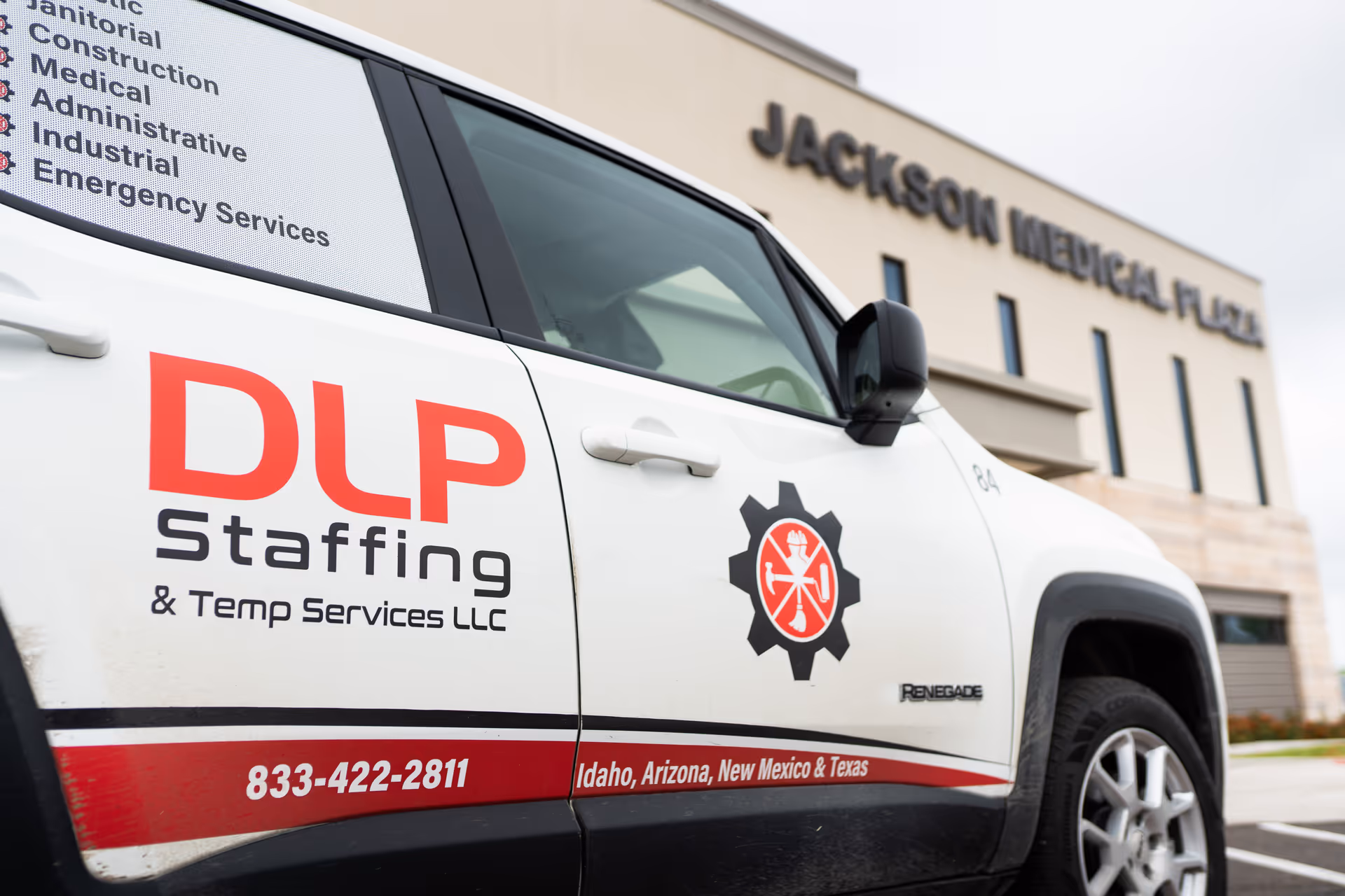 DLP Staffing and Temp Services truck parked outside Jackson Medical Plaza.