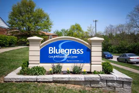 Front sign for Bluegrass Care & Rehabilitation Center with landscaping.
