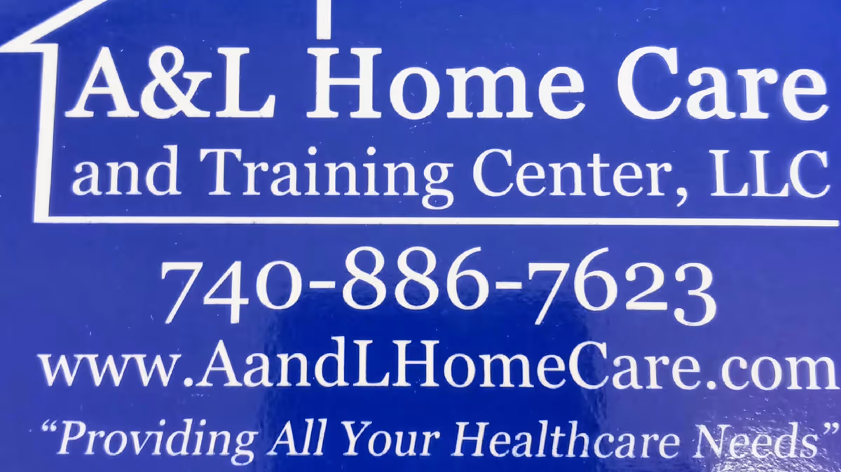 Blue sign displays A&L Home Care and Training Center LLC name, phone, and website.