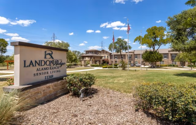 Exterior view of Landon Ridge Alamo Ranch Senior Living with entrance sign.