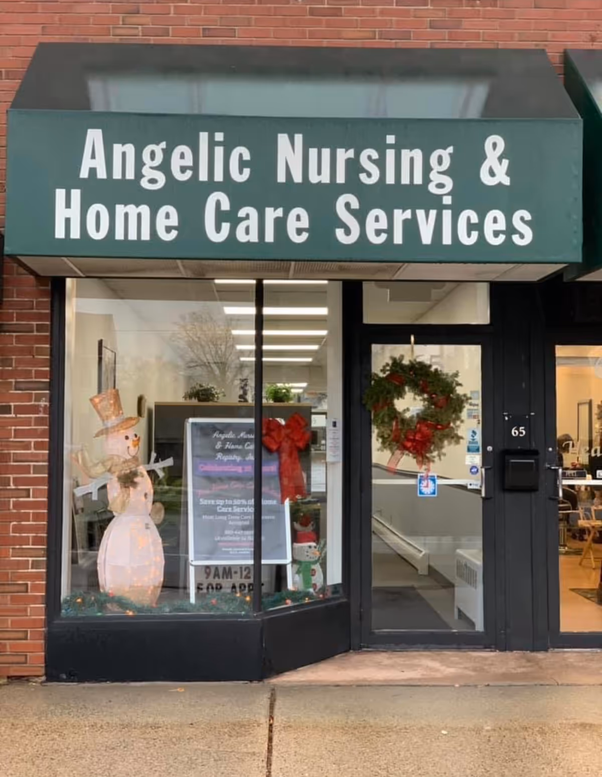 Exterior storefront for Angelic Nursing & Home Care Services with a holiday wreath.
