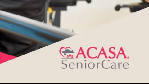 Close-up of the ACASA SeniorCare logo on a white banner