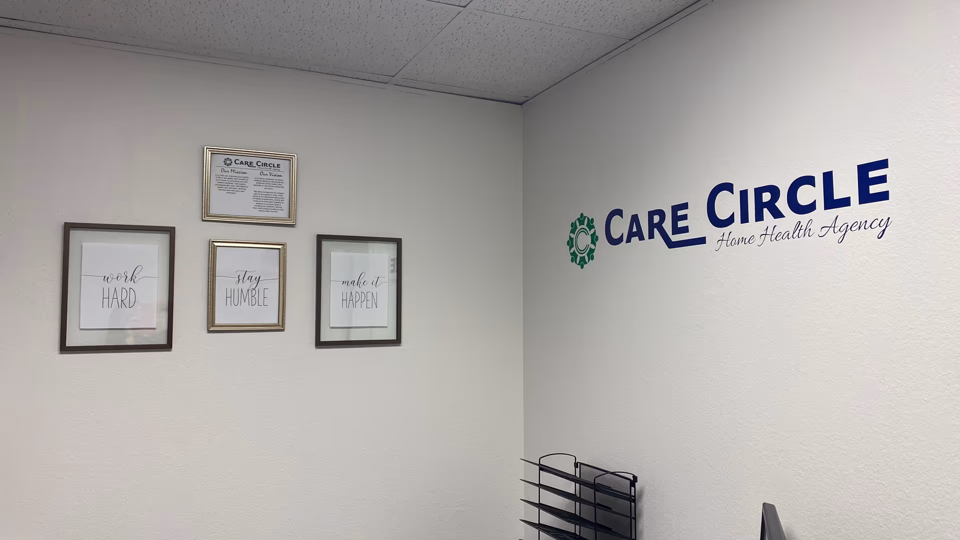 Interior wall with framed quotes and a Care Circle Home Health Agency logo.