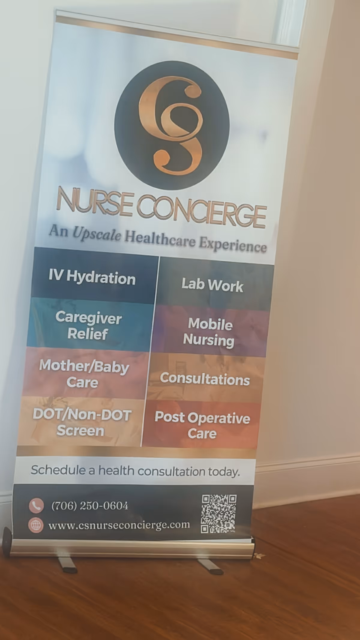 Indoor banner display with C&S Nurse Concierge logo and service options.