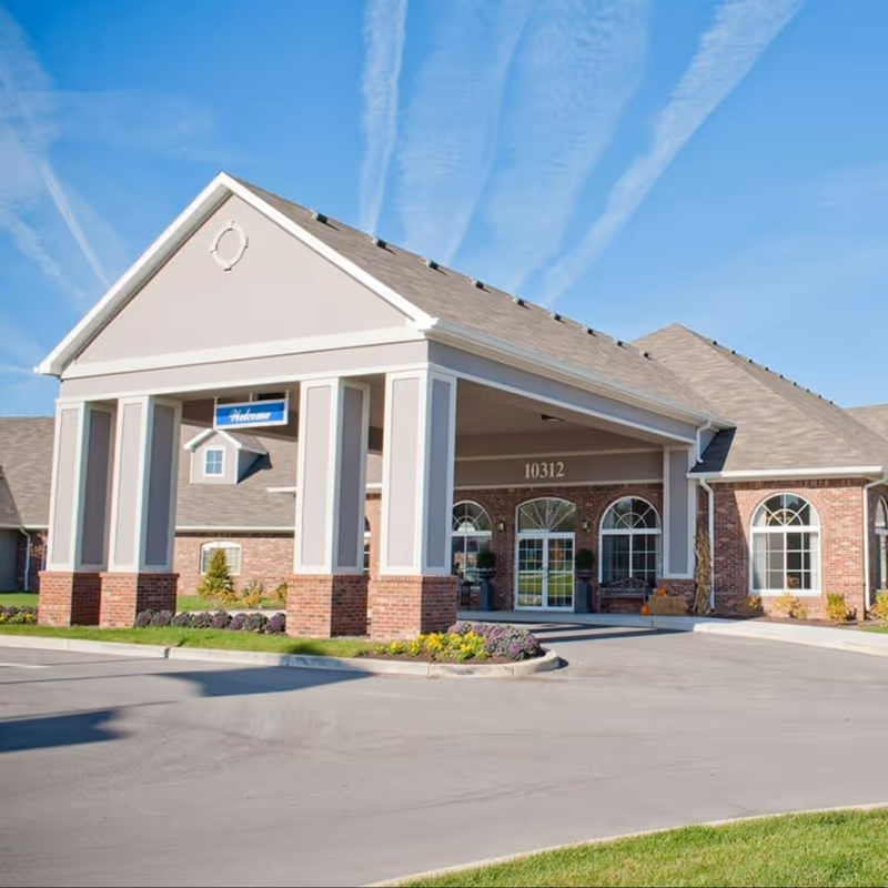 Sage Bluff Health and Rehab Center's brick front entrance with a covered drive-up canopy.