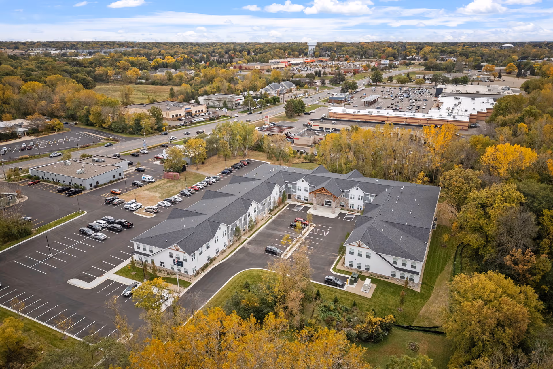 Aerial view of Caretta Senior Living Maplewood campus showing connected buildings and parking.