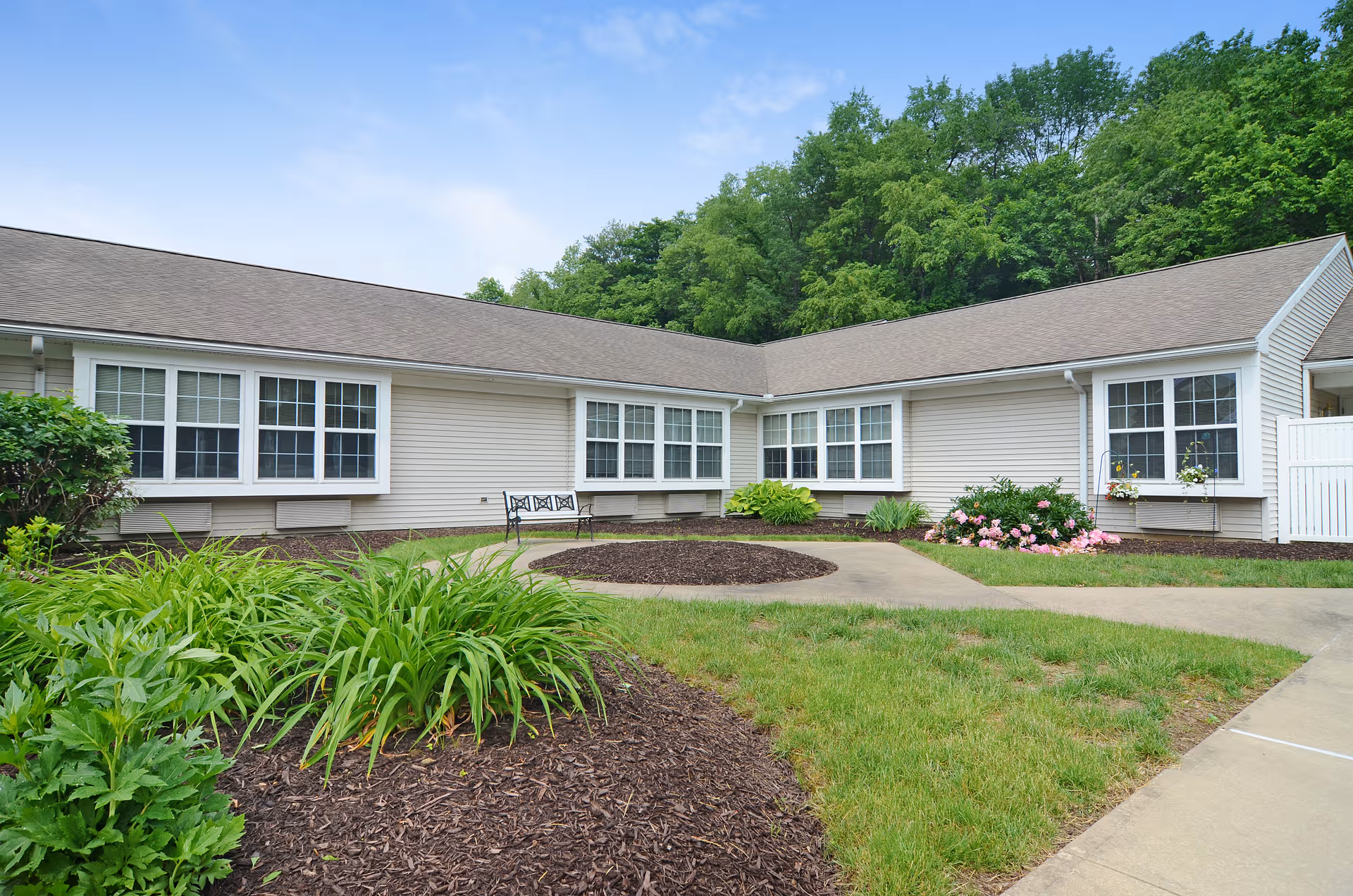 Exterior of Celebration Villa of Loyalsock, a single-story senior living facility with landscaped front yard.