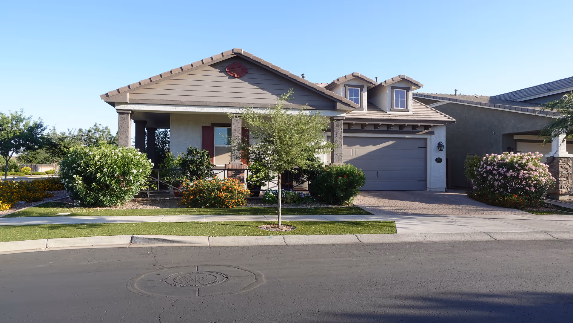 Front view of Magnolia Homecare at Mulberry with garage, porch, and landscaped front yard.