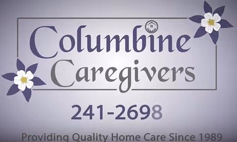 Sign displaying Columbine Caregivers with purple flowers and a phone number on a wall.