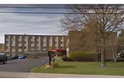 Exterior view of Susquehanna Nursing and Rehabilitation Center with parking.