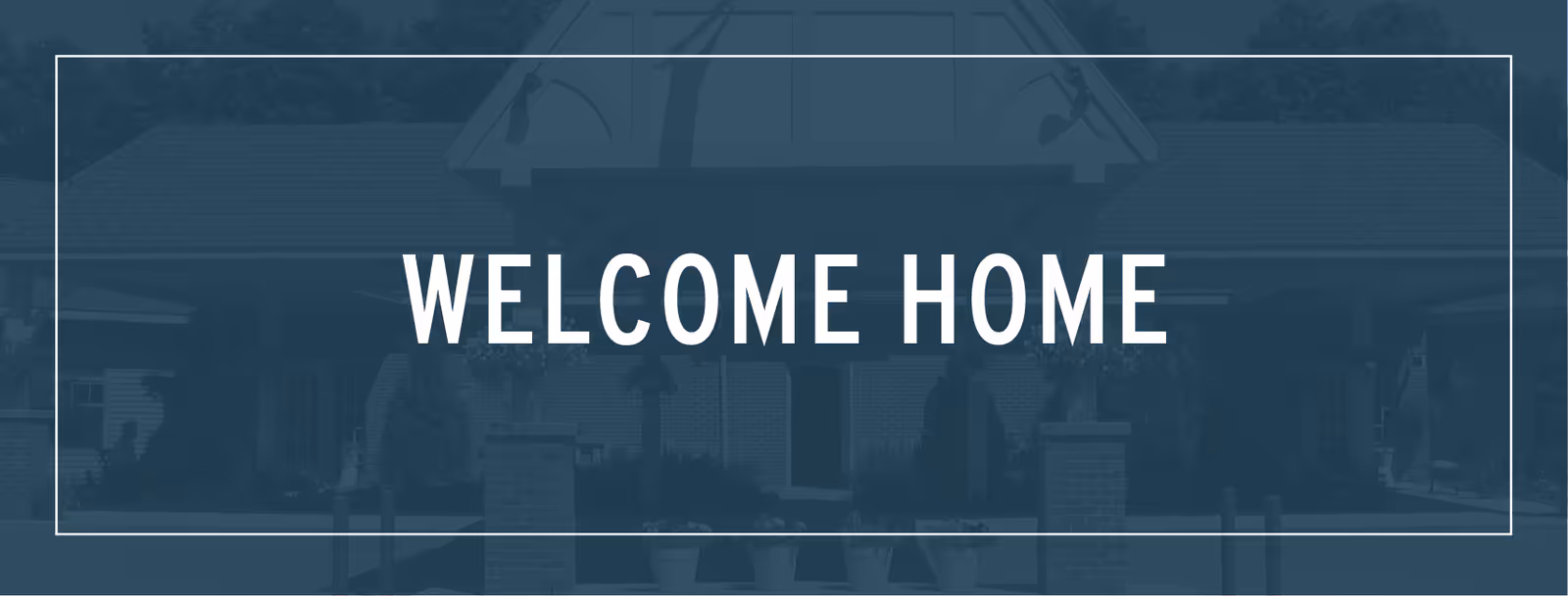 Front view of a retirement village entrance with a large Welcome Home sign
