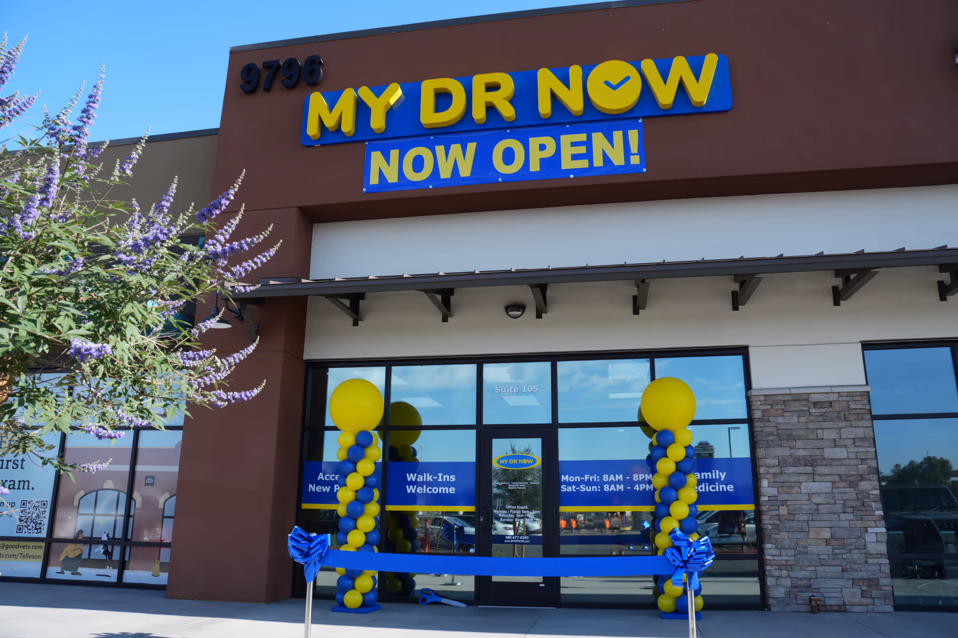 MY DR NOW storefront with Now Open sign, balloons, and ribbon outside.