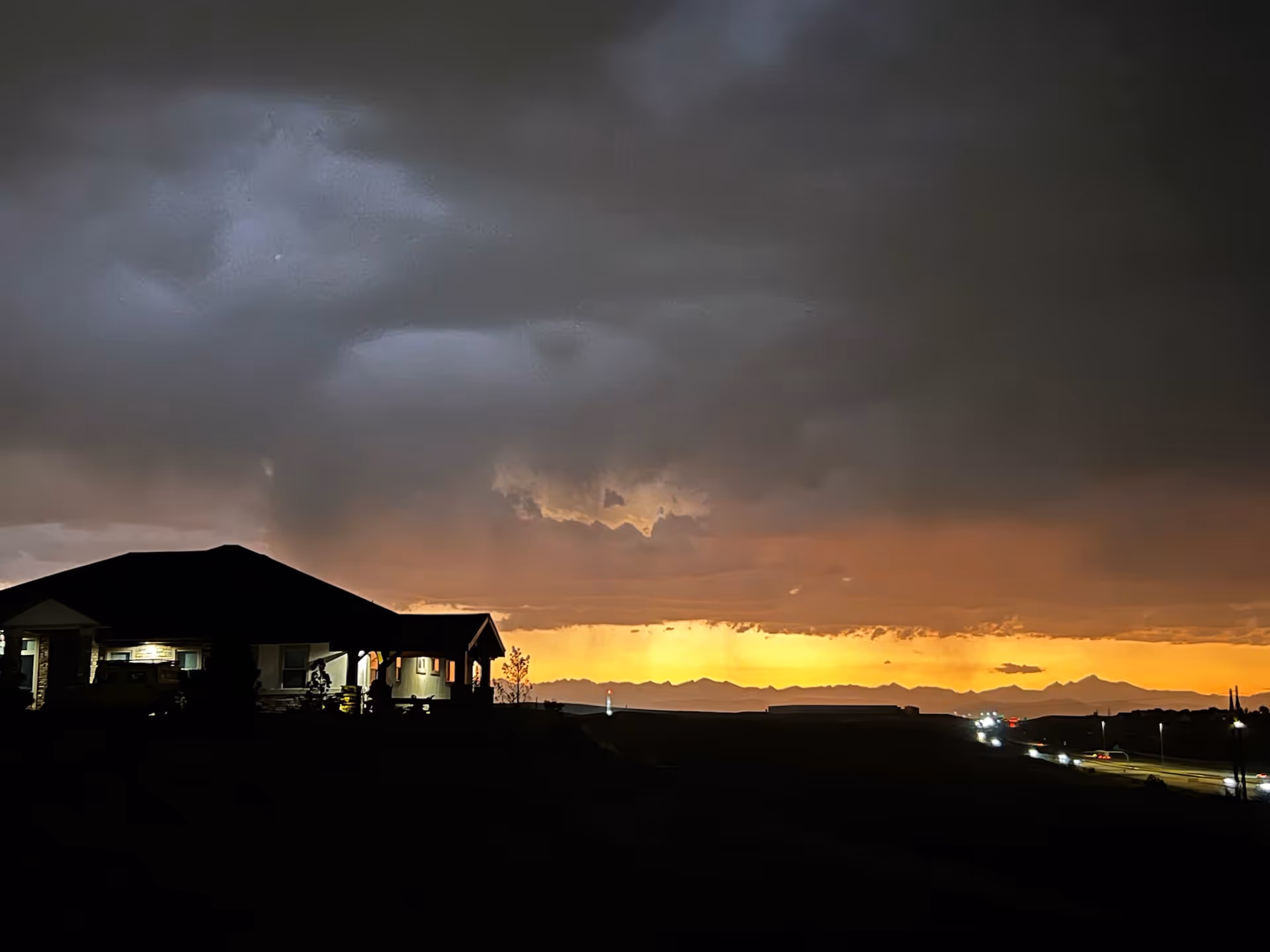 Exterior view of Lighthouse on Florence Memory Care at sunset with stormy clouds