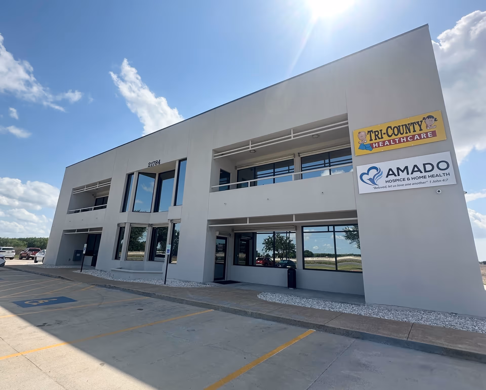 Modern two-story medical building with Tri-County Healthcare signage and parking lot.