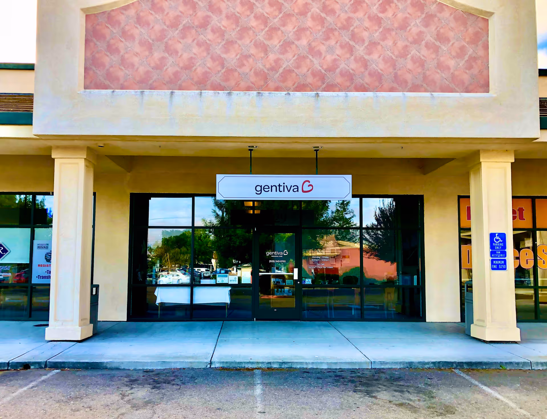 Exterior view of a Gentiva Personal Care facility entrance with glass doors.
