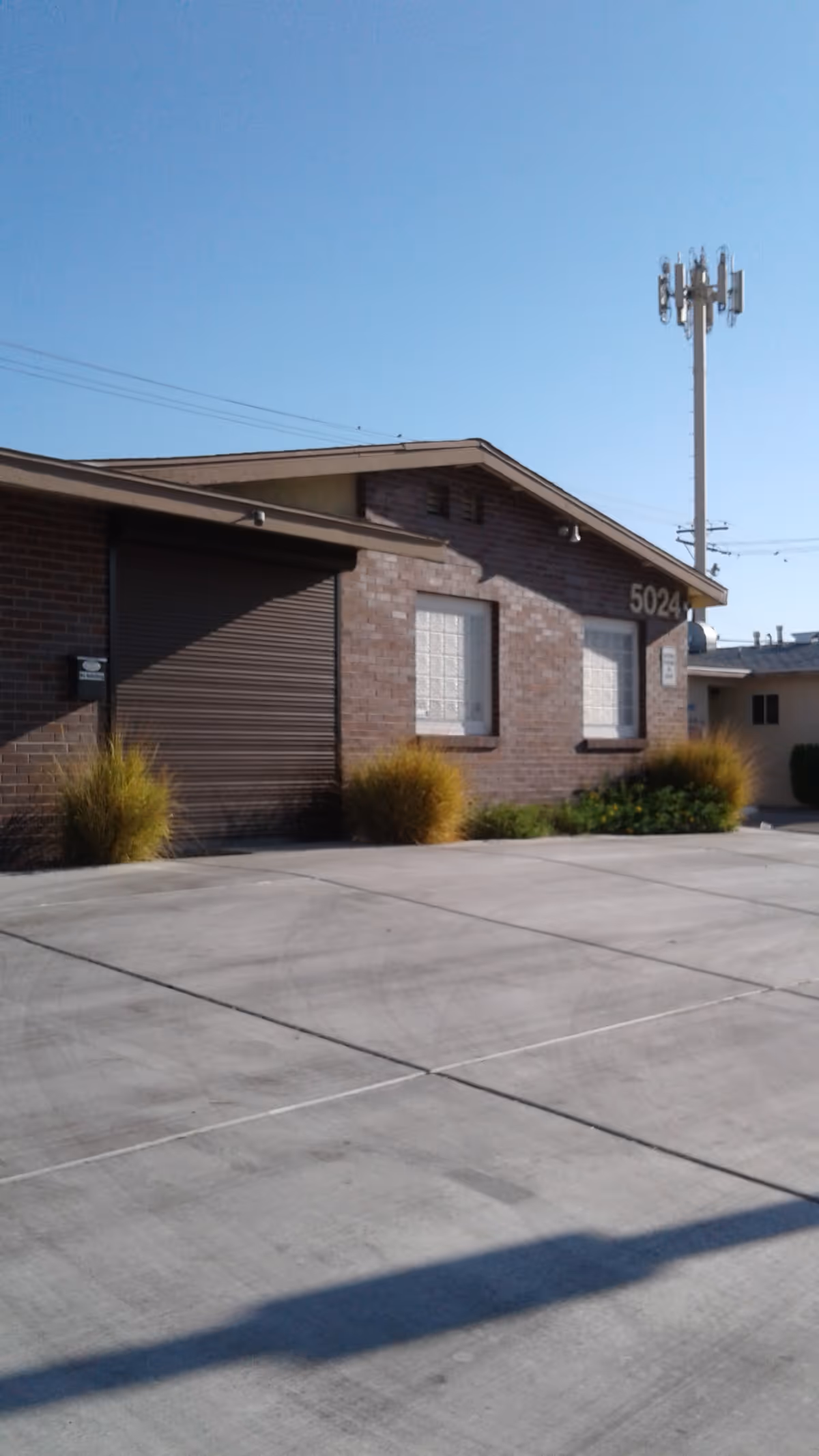 Exterior view of a brick senior care facility with address 5024.