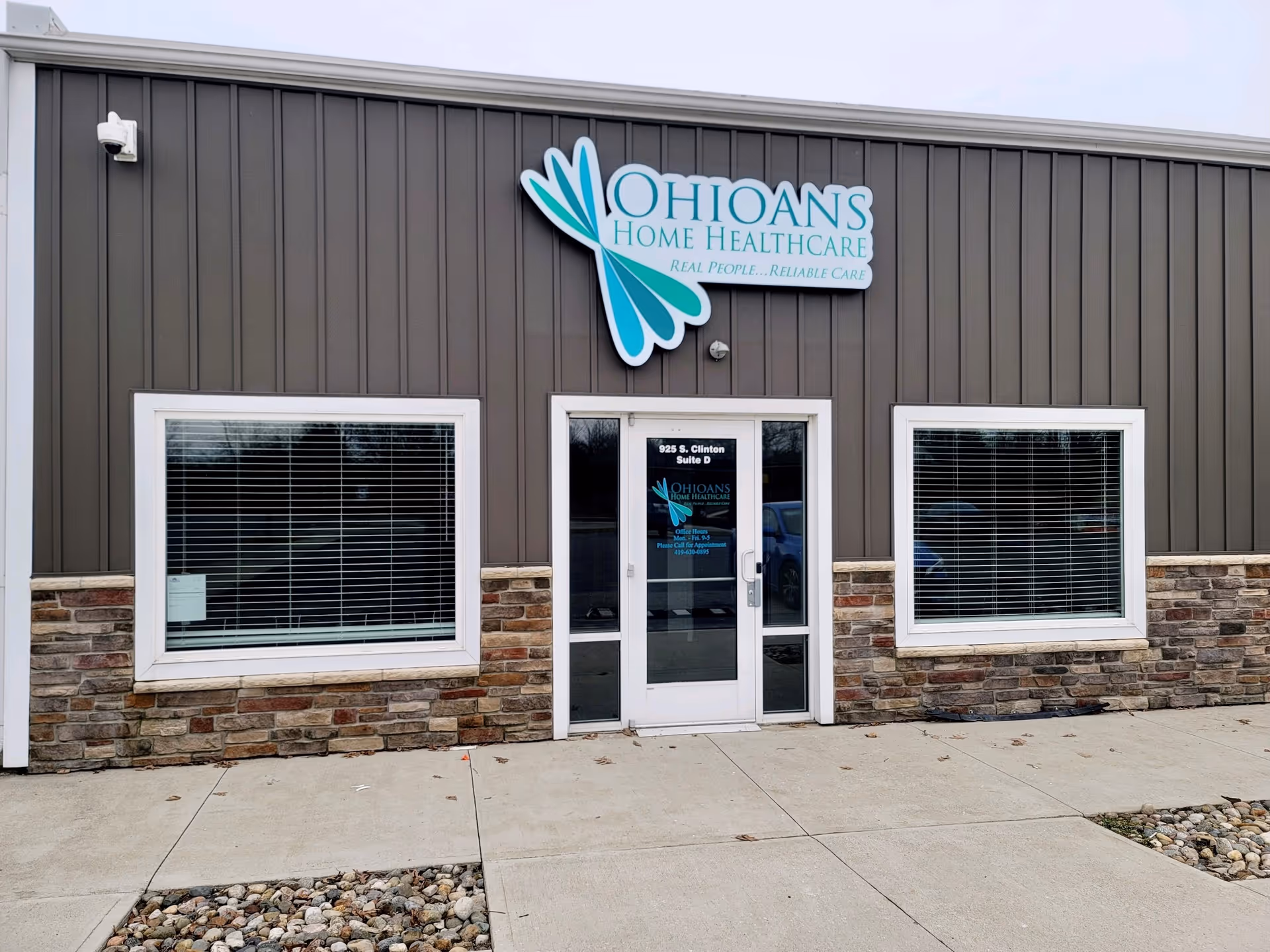 Front view of Ohioans Home Healthcare storefront with sign, doors, and windows.