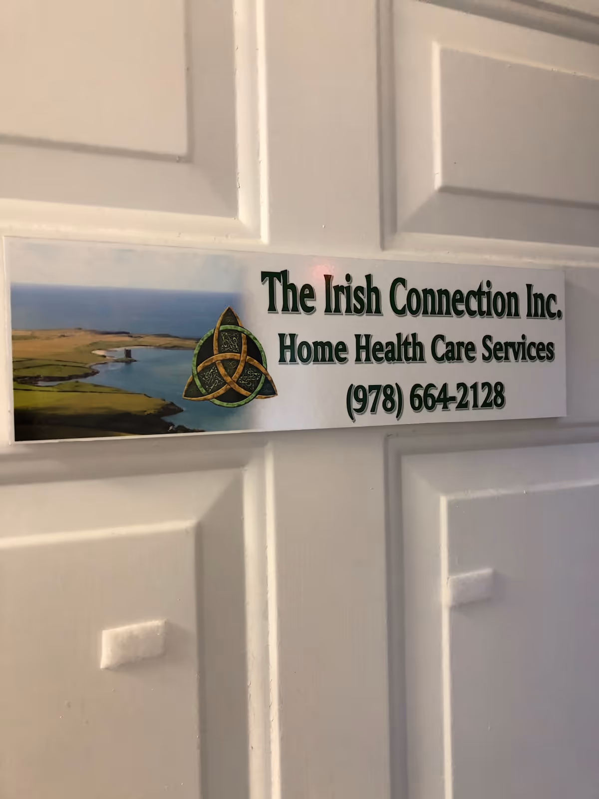 Interior door with a sign advertising The Irish Connection Home Health Care Services.