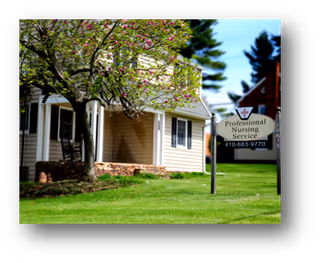 Exterior view of a senior nursing facility with a lawn, tree, and entrance sign.