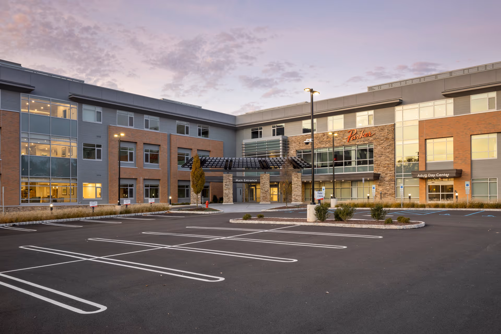 Front exterior of Parker at Somerset with parking and entrance.