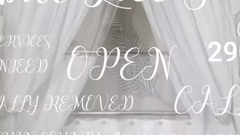 Curtain-covered entrance with large OPEN lettering and decorative script overlay