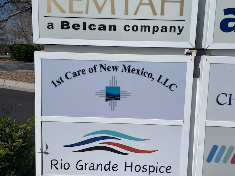 Exterior sign display for 1st Care of New Mexico, LLC and Rio Grande Hospice.