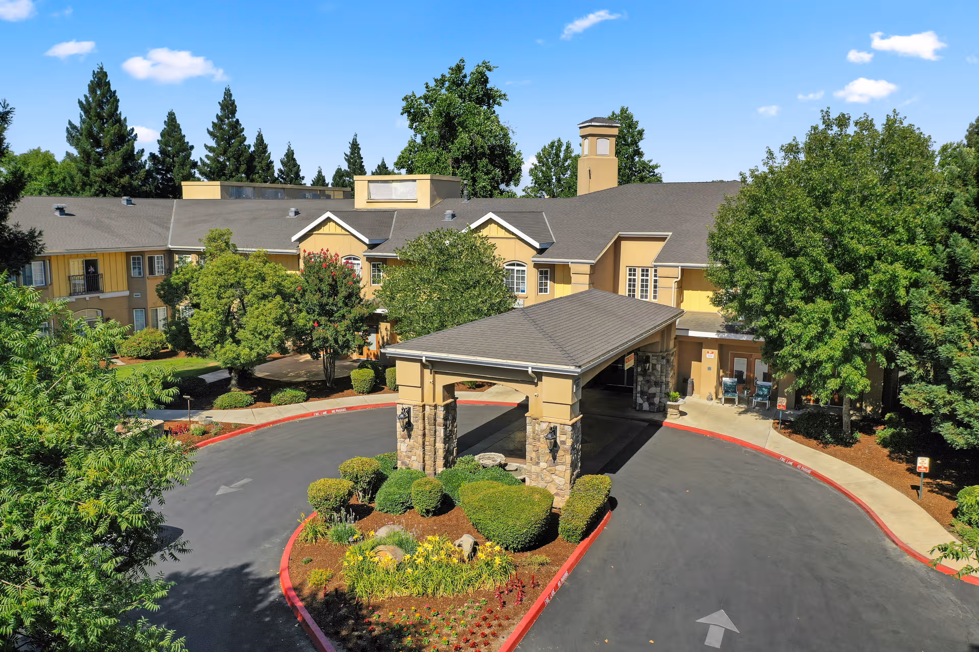 Quail Park on Cypress exterior showing sheltered entrance and circular driveway.