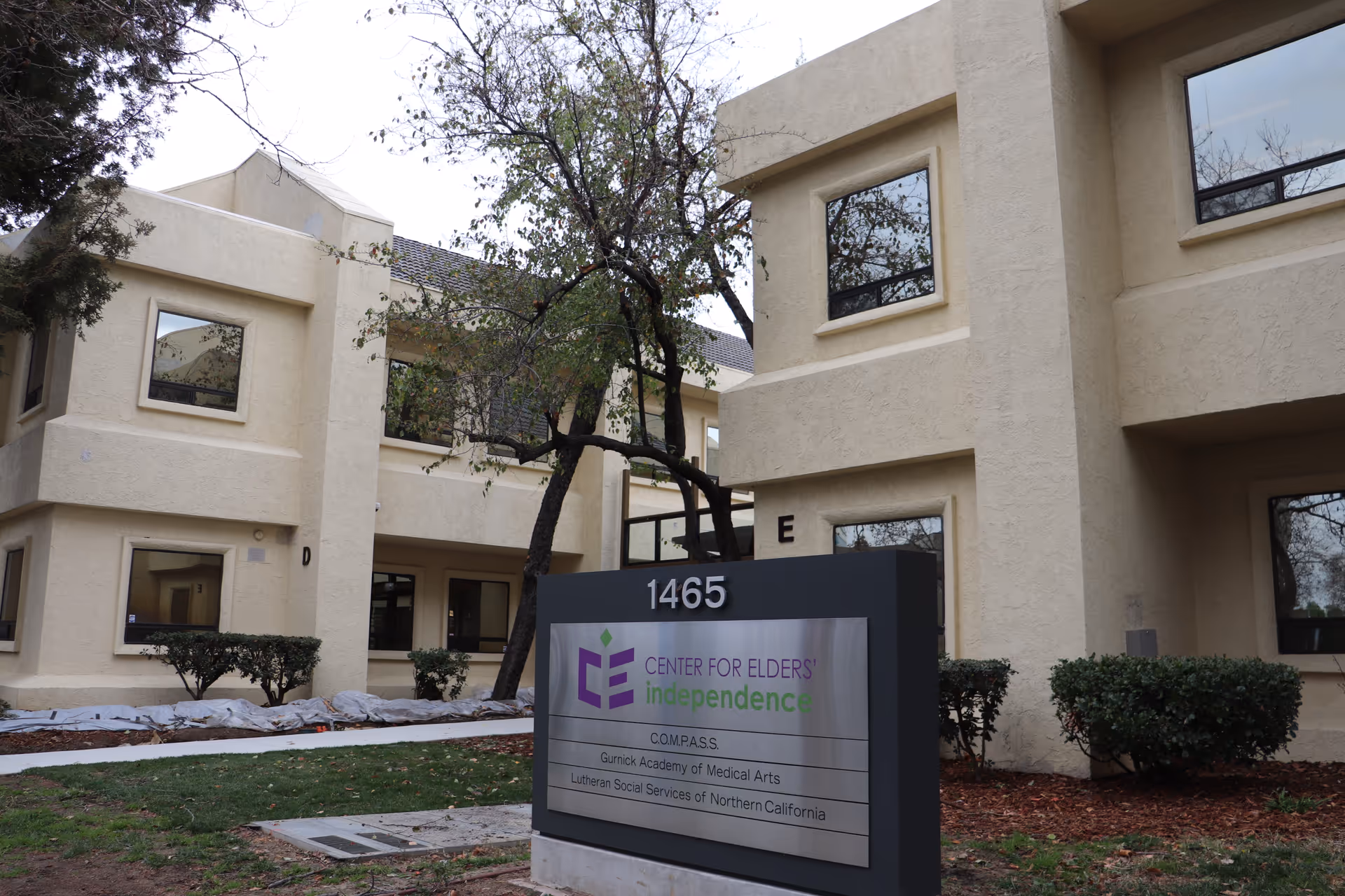 Exterior view of Center for Elders' Independence building with front sign.