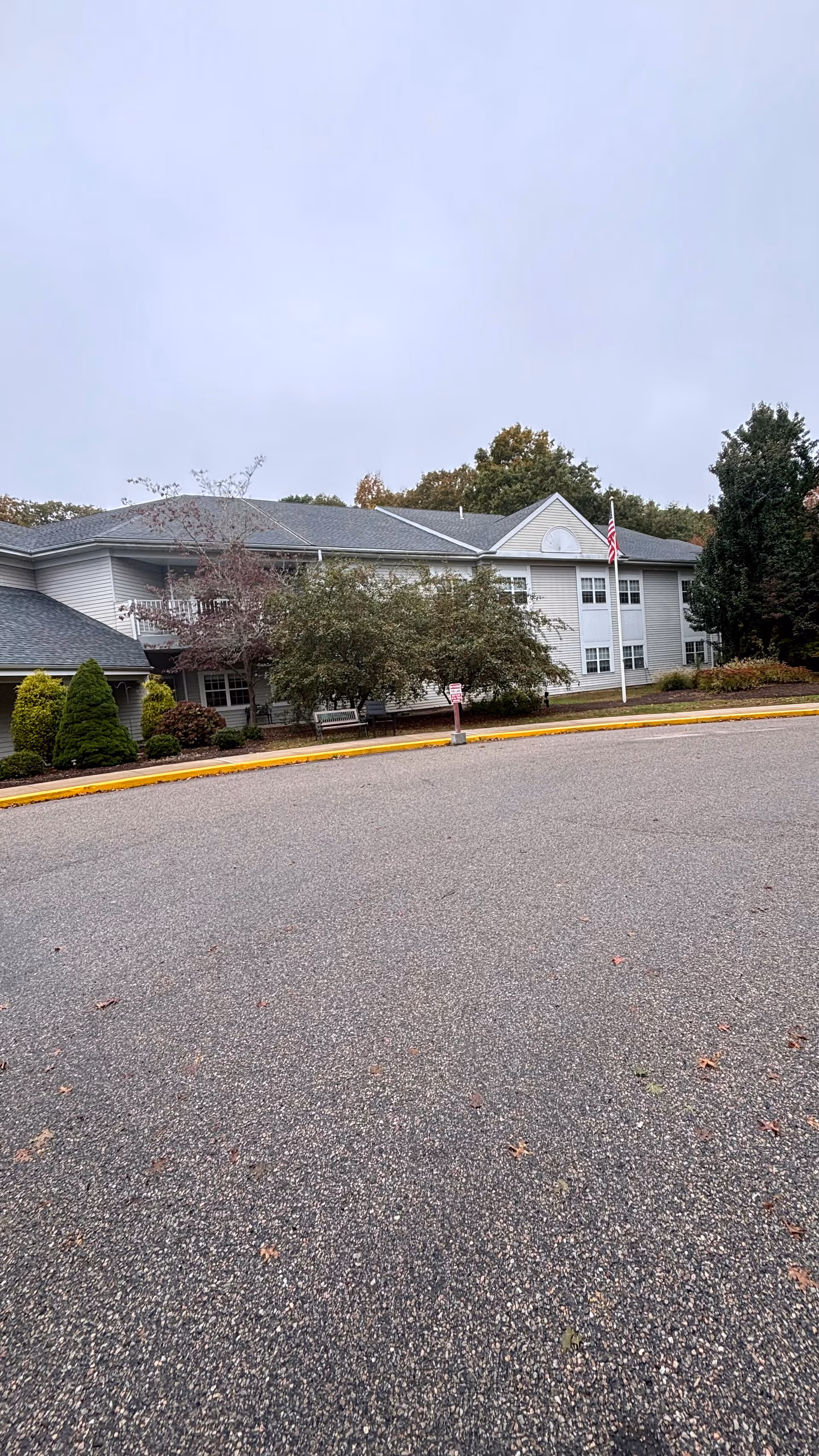 Exterior view of Pendleton Health and Rehabilitation Center with parking and landscaping.