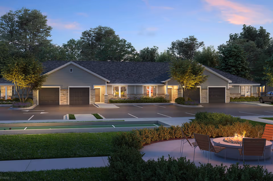 Exterior view of The Retreat at Barber's Hill with a fire-pit patio.