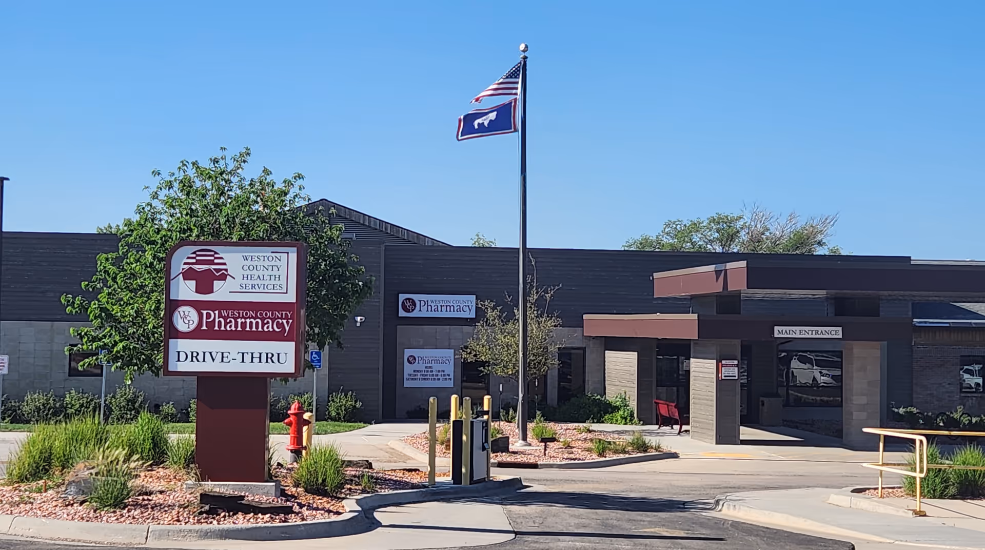 Exterior view of Weston County Health Services facility with main entrance and signage.