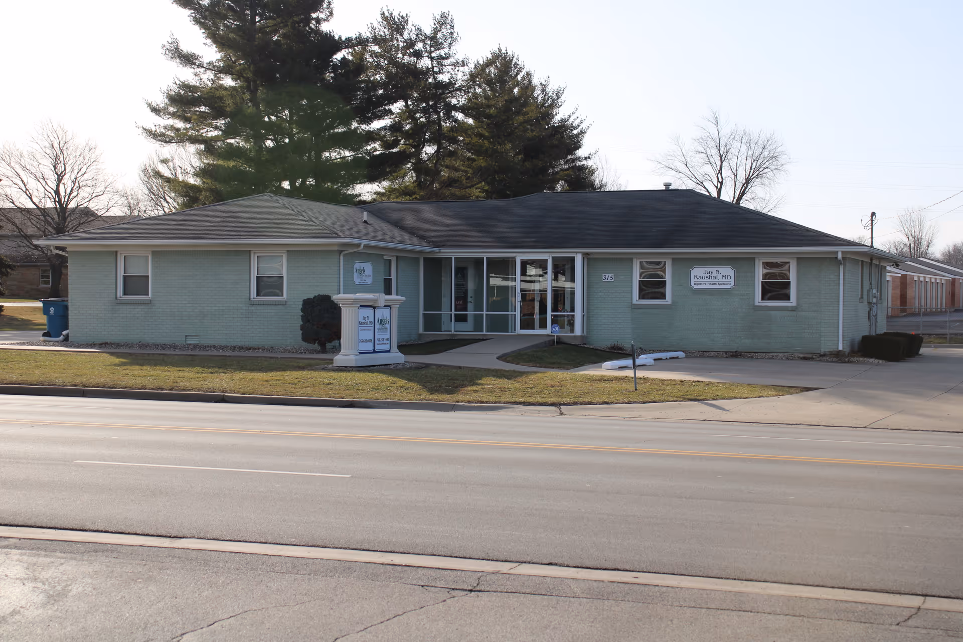 Front view of Angels Care Home Health Terre Haute in a single-story mint-green building.