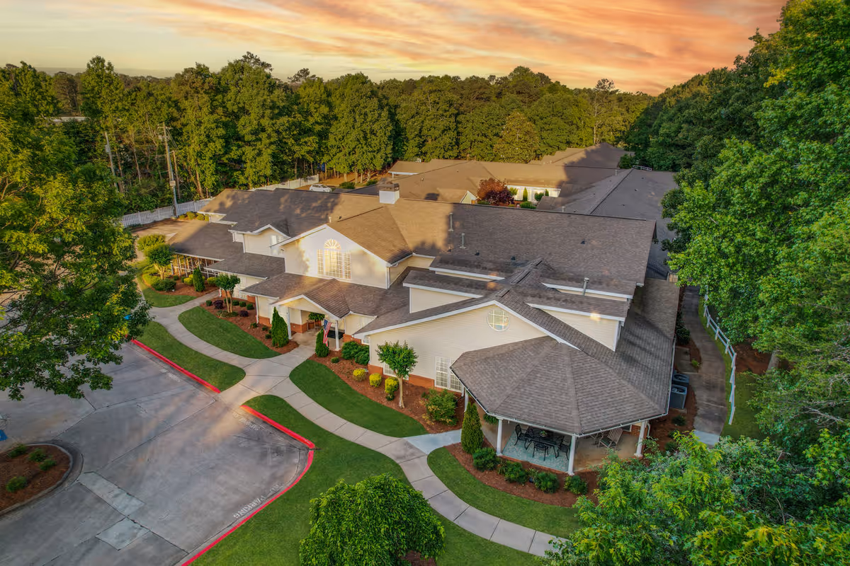 Aerial view of PruittPlace Peachtree City exterior building with surrounding landscaping