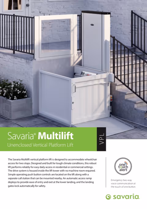 Exterior view of a building entrance with a vertical platform lift and stairs.
