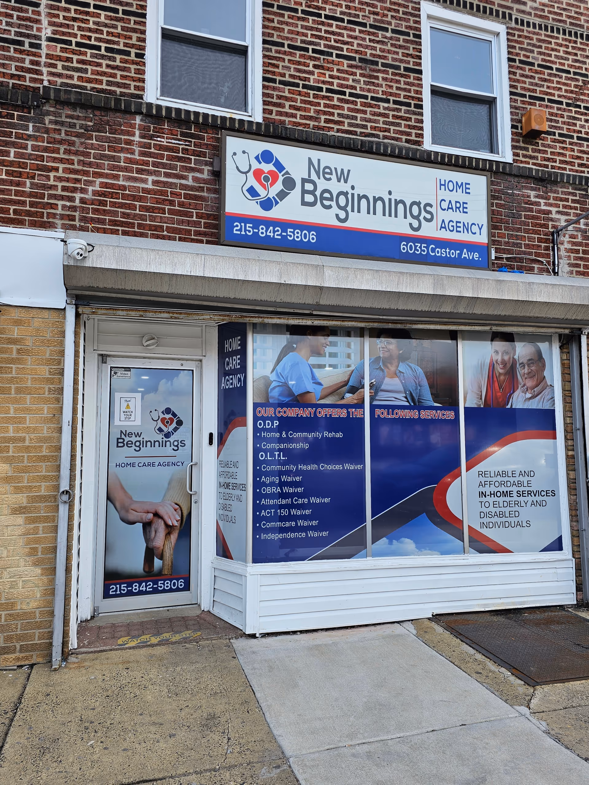 Front view of New Beginnings Home Care Agency storefront with signage and posters.