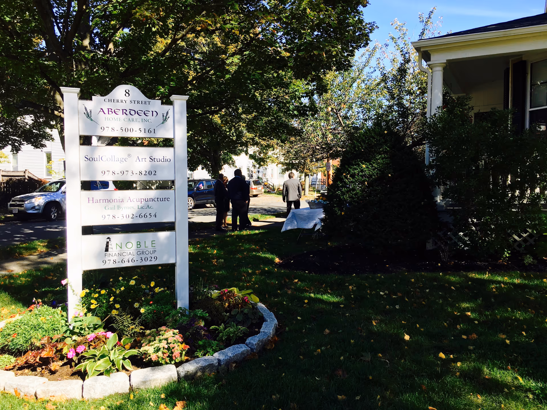 Exterior view of Aberdeen Home Care, Inc. sign in front yard beside building.