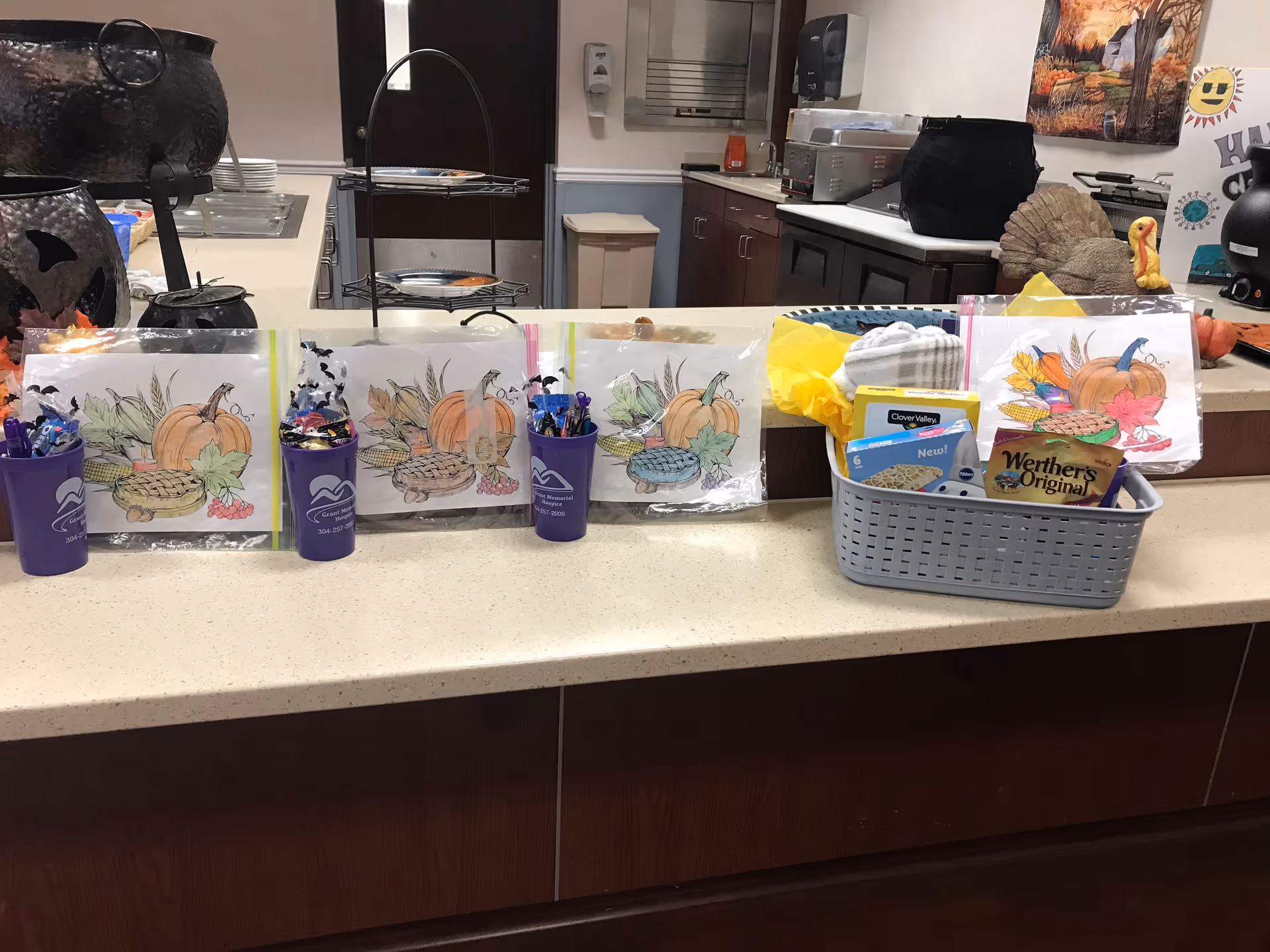 Interior counter with coloring pages, pens, and craft supplies for residents.