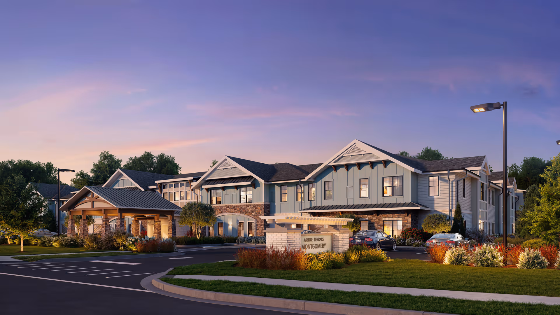 Exterior view of Arbor Terrace Montgomery, showing the entrance, parking, and landscaped grounds.