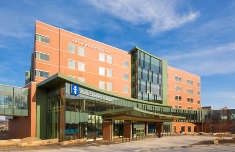 Exterior view of Akron Children's Outpatient Surgery Center, brick building with glass entrance.