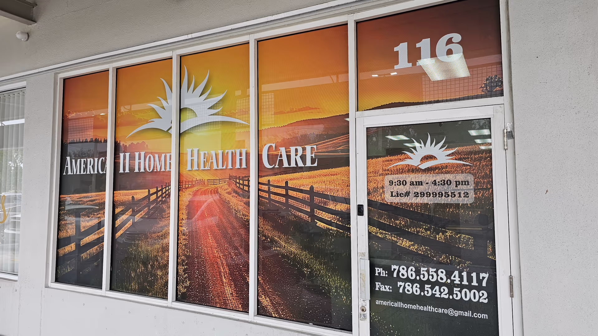 Exterior storefront windows display 'America II Home Health Care' with a rural backdrop.