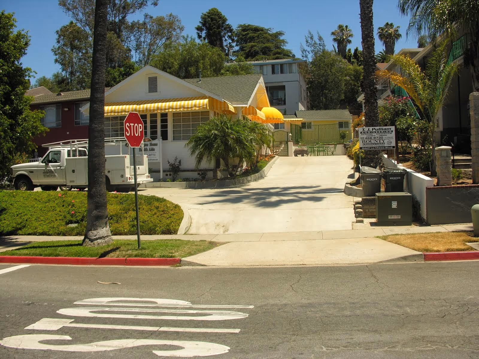 A street view shows a senior living facility entrance with yellow awning, palm trees, and seating.