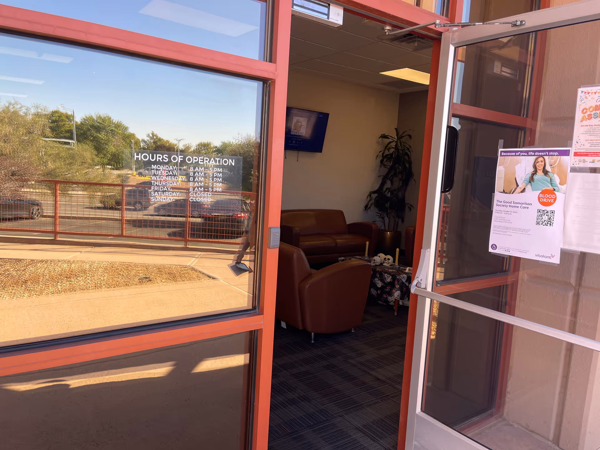 Heritage Healthcare Services Albuquerque lobby visible through glass doors with brown leather seating