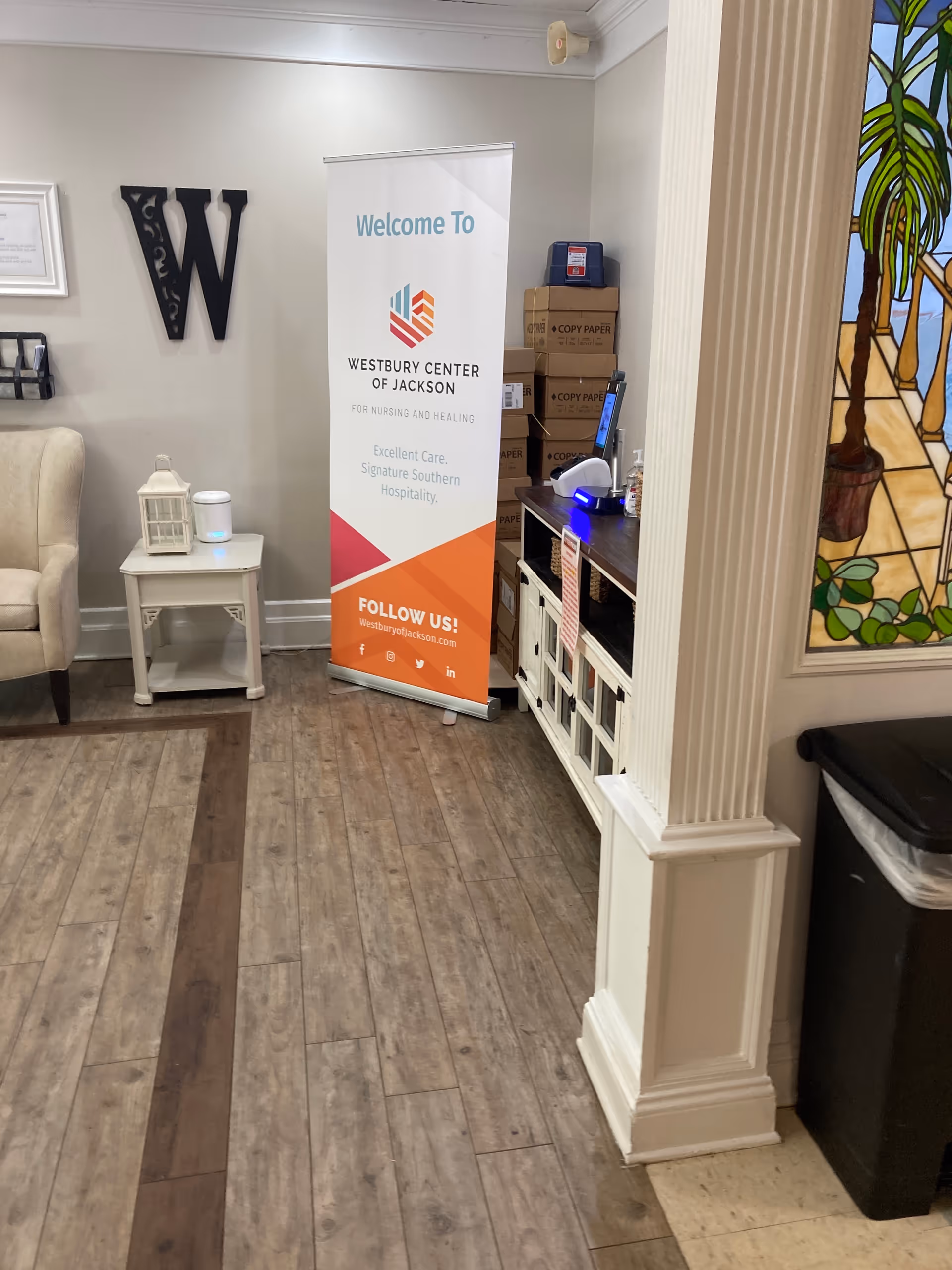 Lobby area with welcome banner for Westbury Center of Jackson inside facility