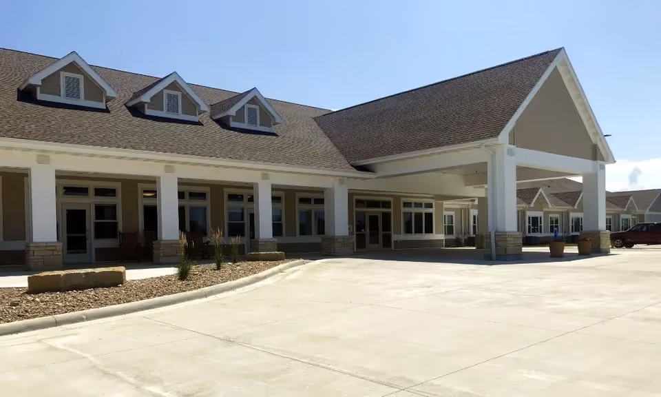 Exterior view of Willow Winds Assisted Living front entrance and parking area.