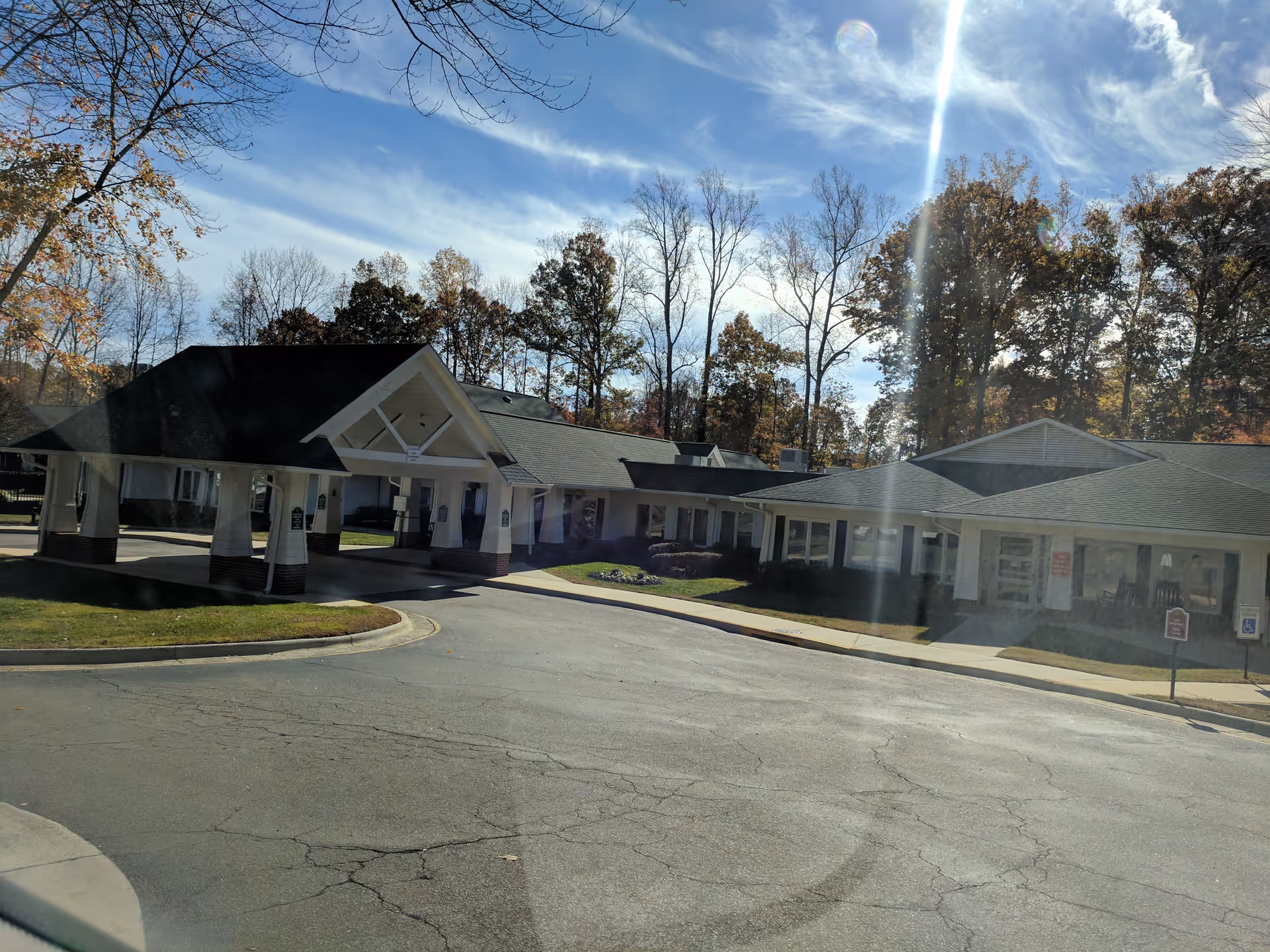 Exterior view of Hillcrest Raleigh at Crabtree Valley with a covered entrance